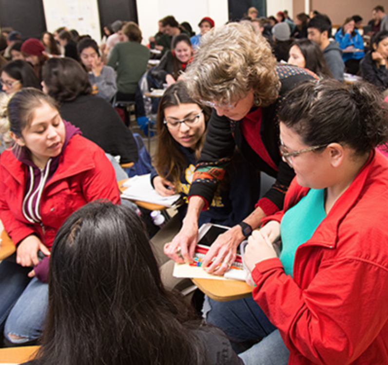 Susan Strome with students in Active Learning Classroom