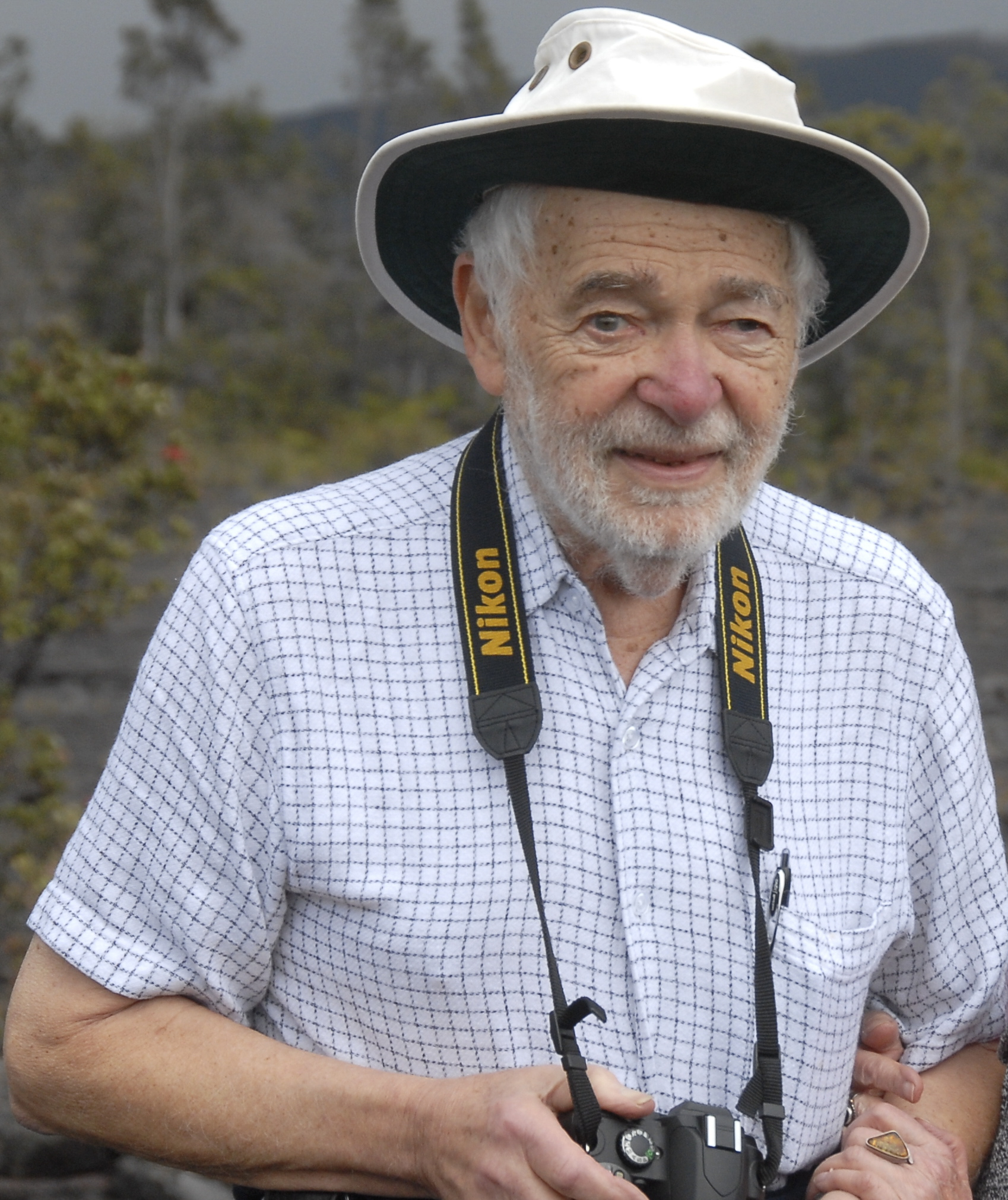 David Rigler holding camera