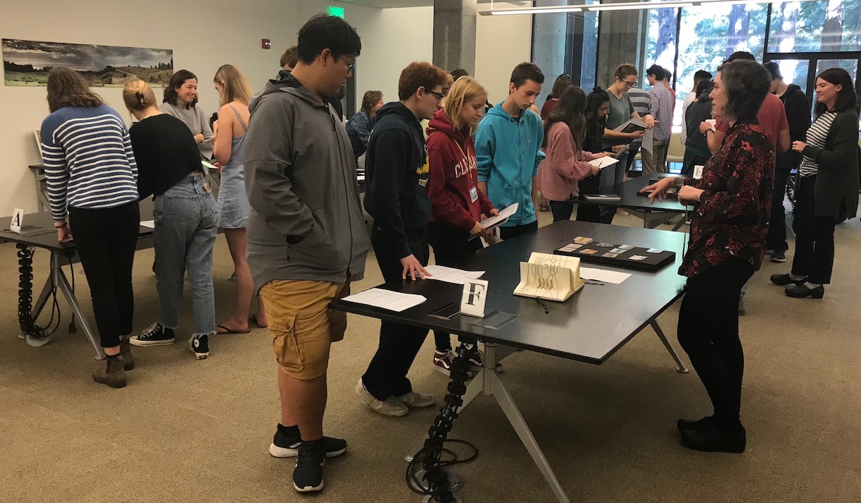 Students viewing materials in Special Collections