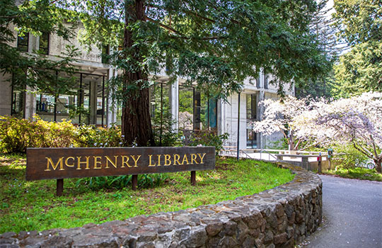 Photo showing the McHenry Library sign in front of the library building